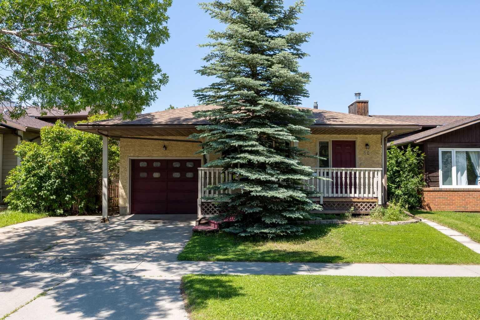 Property Photo:  80 Macewan Drive NW  AB T3K 2P7 
