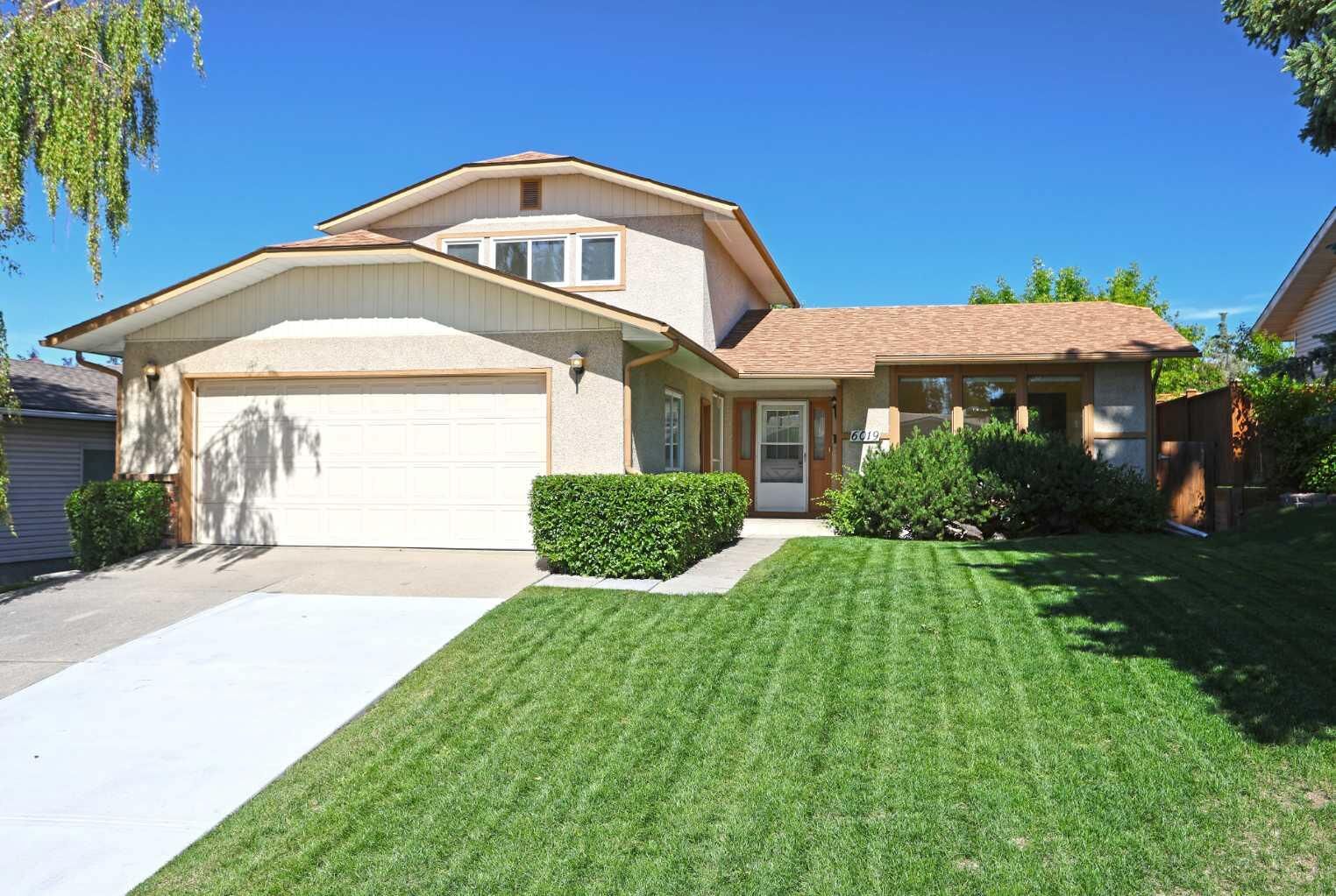Property Photo: 6019 Dalcastle Crescent NW AB T3A 1R7