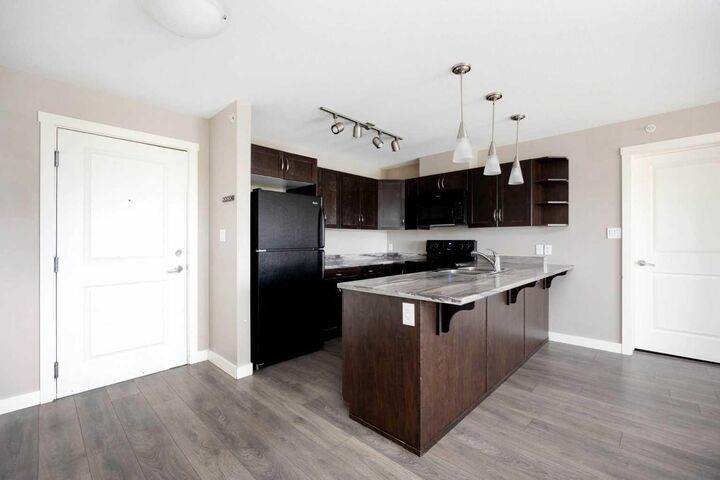 Property Photo:  115 Denholm Gate Gate 408  AB T9H 0B2 