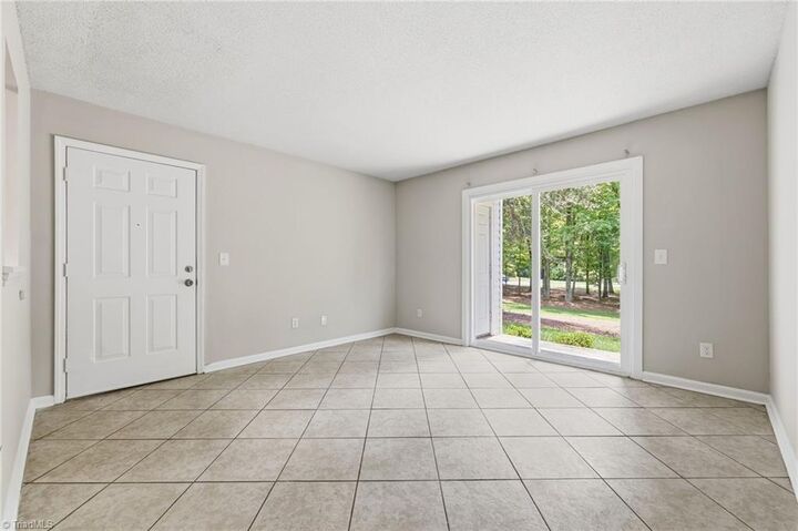 Property Photo:  5611 Hornaday Road K  NC 27409 