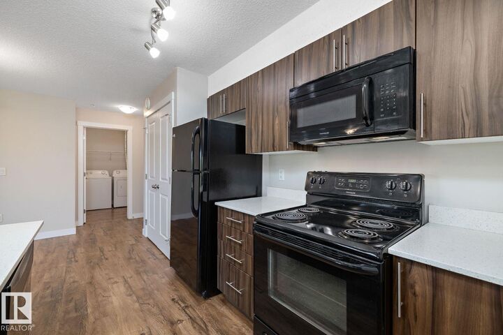 Property Photo: 4615 199 Street NW AB T6M 1M5
