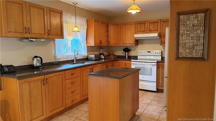 Property Photo:  56 Premiere Avenue  NB E7E 1K1 