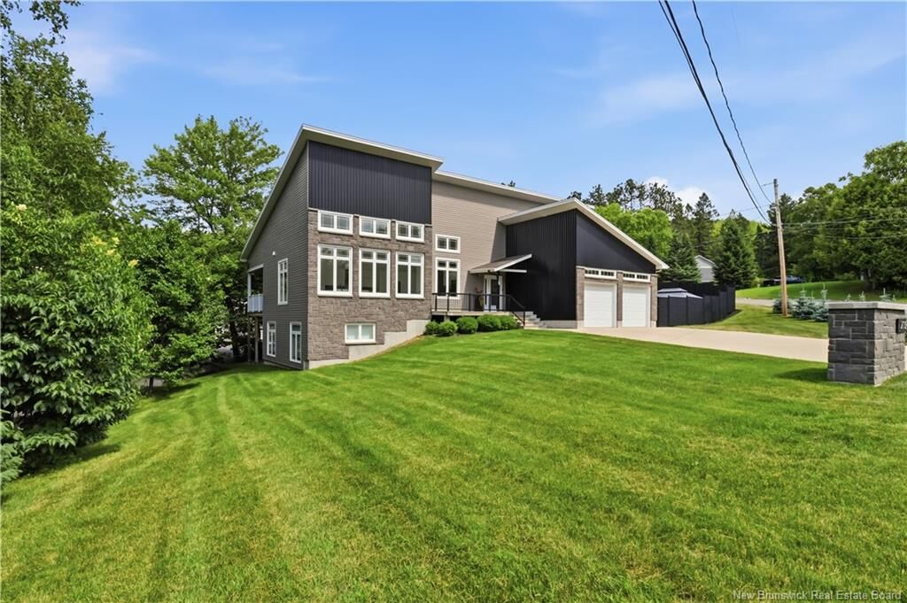 Property Photo:  715 Golf Club Road  NB E3B 7S5 