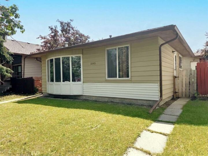 Property Photo: 1095 Berkley Drive NW AB T3K 1S6