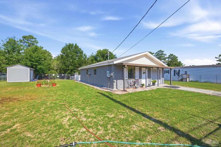 Property Photo:  1935 America Ave  FL 32563 
