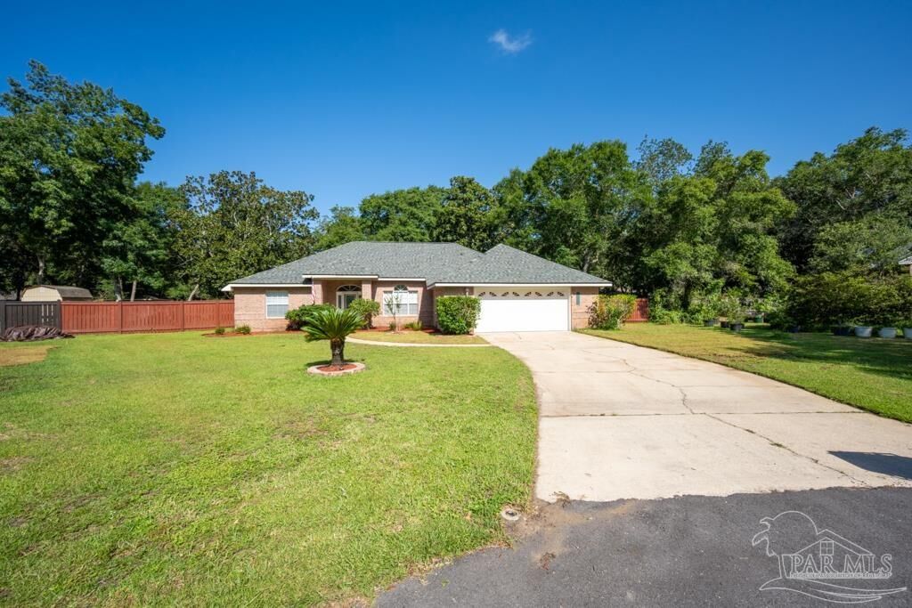 Property Photo:  6900 Calle De Caballero  FL 32566 