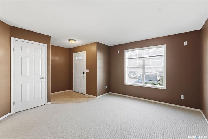 Property Photo:  203 Herold Terrace 50  SK S7V 1H8 