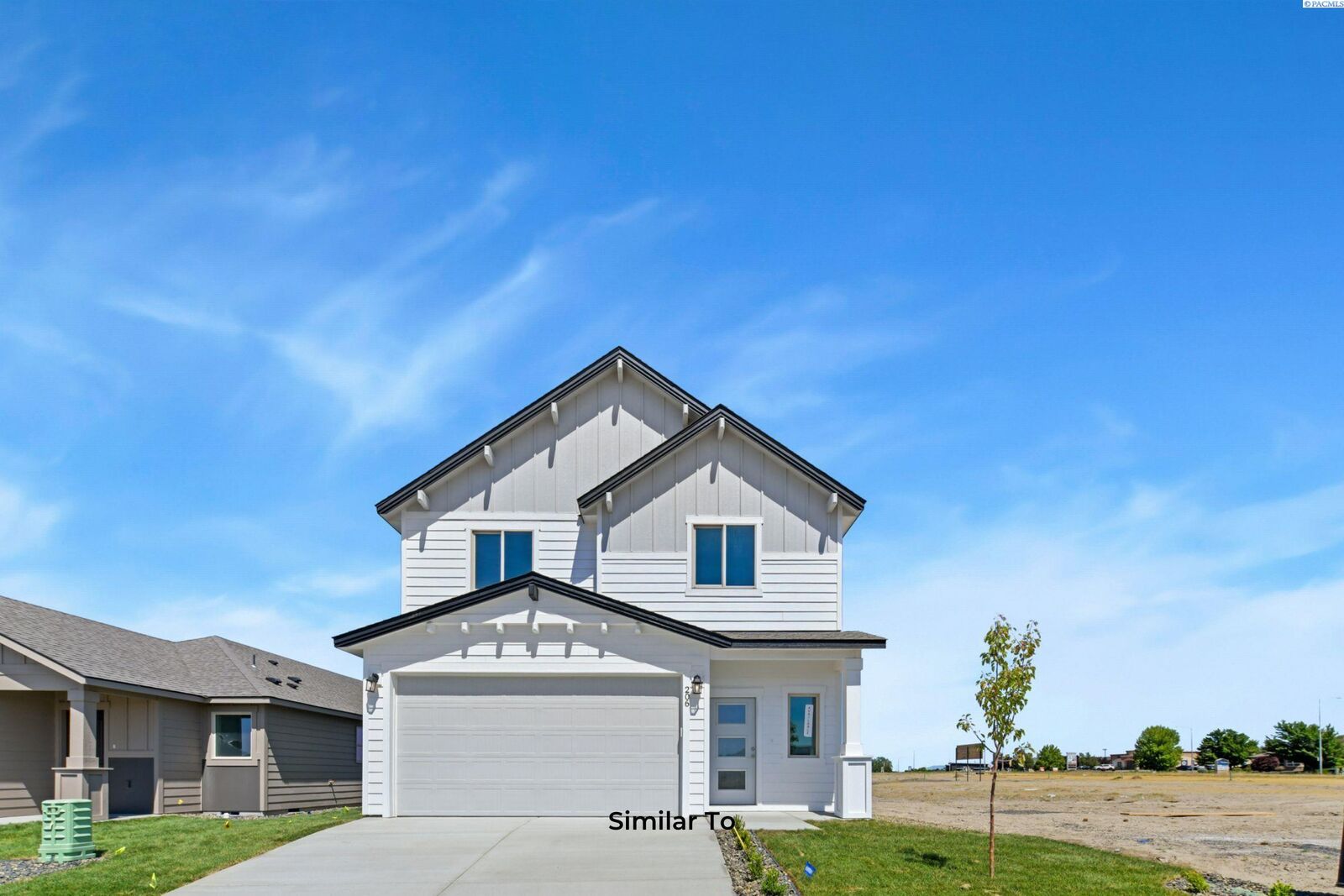 Property Photo:  727 Honeylicious St.  WA 99352 