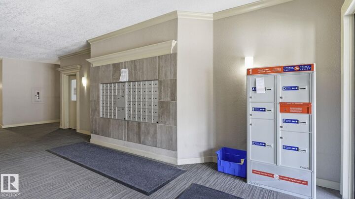 Property Photo: 16235 51 Street NW 303 AB T5Y 3C7