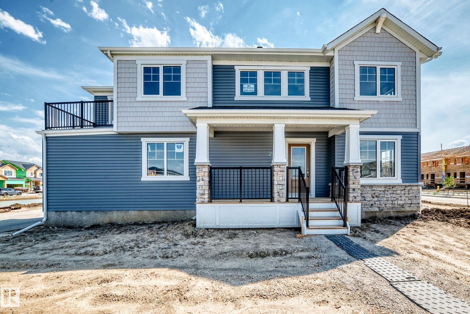 Property Photo:  1061 Wolf Willow Way  AB T8H 3B3 