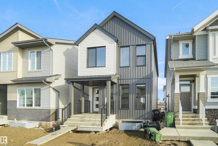 Property Photo:  21035 25 Avenue NW  AB T5Y 4G2 