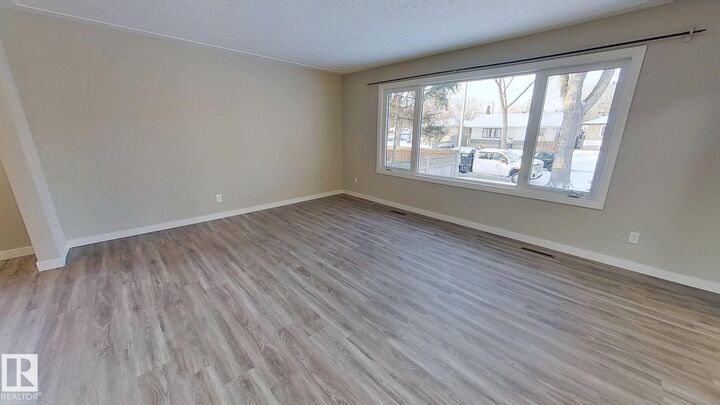 Property Photo: 12211 52 St NW AB T5W 3K3