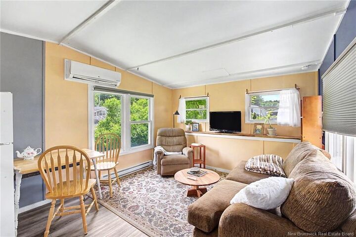 Property Photo: 225 Driftwood Loop NB E3B 7P1