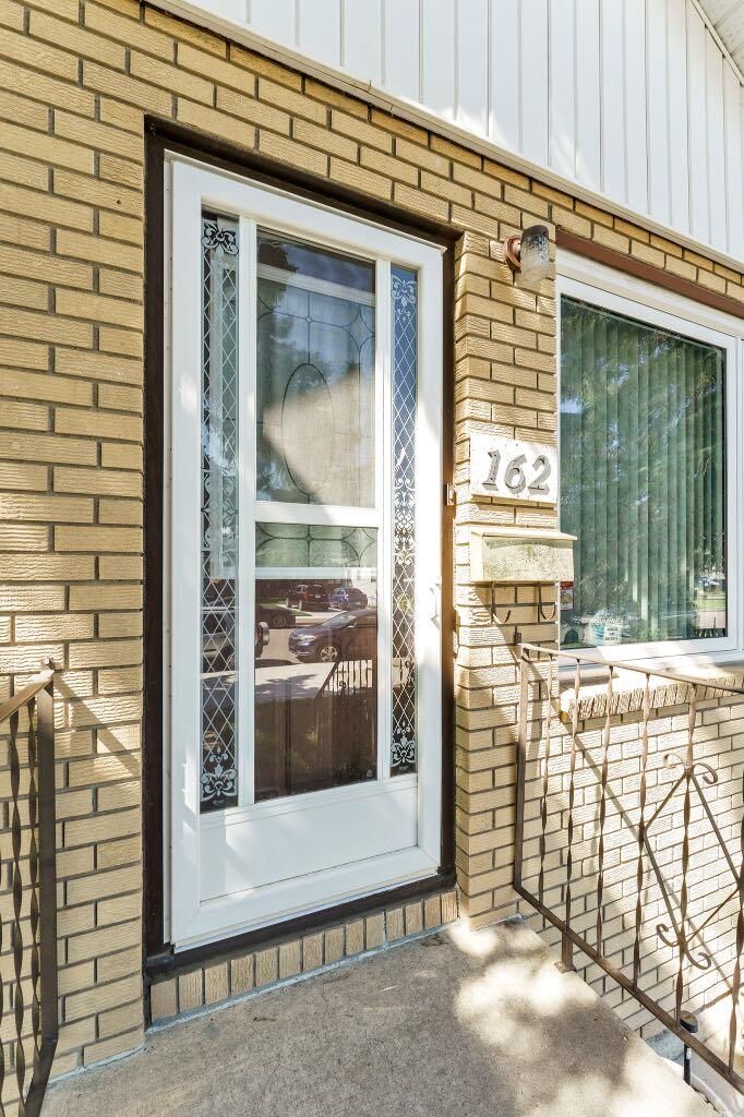 Property Photo: 162 2 Street NE AB T1A 5K9