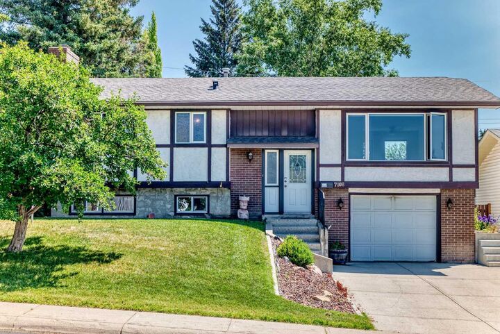 Property Photo: 7108 Silverview Road NW AB T3B 3M1