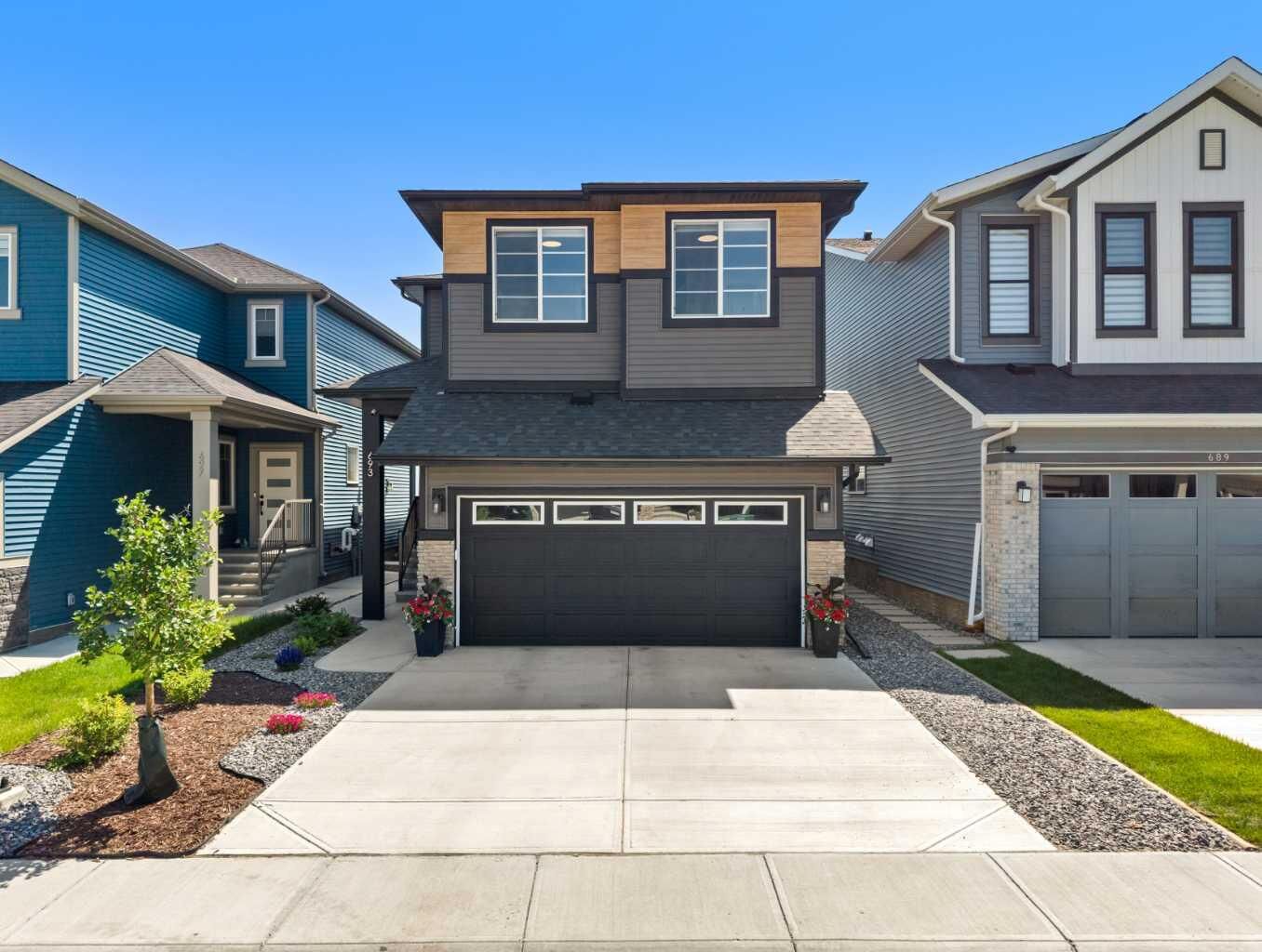 Property Photo:  693 Creekmill Court SW  AB T4B 5L3 