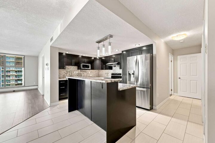 Property Photo:  1100 8 Avenue SW 606  AB T2P 3T9 