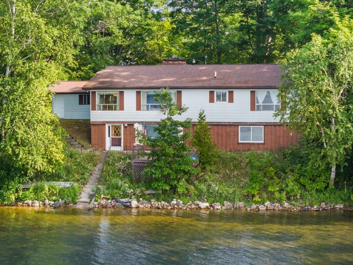 Property Photo:  7760 Paradise Trail  MI 49718 