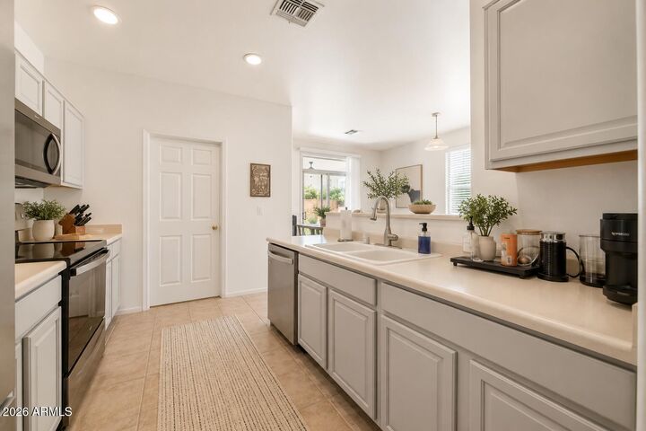 Property Photo: 7027 W St Charles Avenue AZ 85339