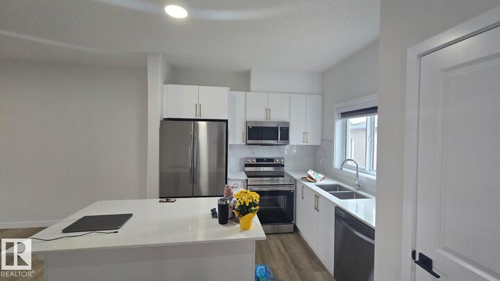 Property Photo: 336 Munn Way AB T9E 0S9
