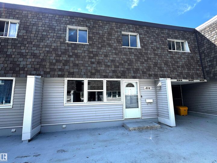 404 Village On The Green NW — photo 1