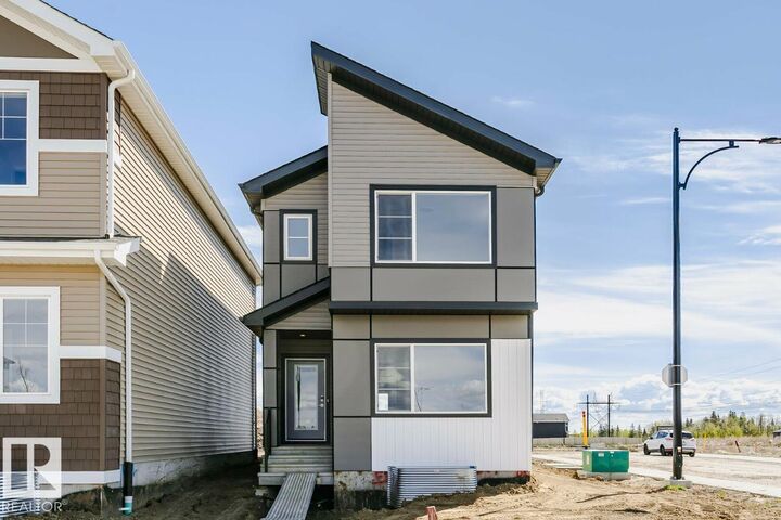 Property Photo: 303 Edgemont Drive NW AB T6M 3G7
