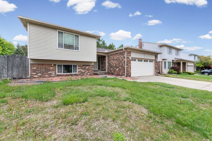 Property Photo: 38982 Sutton Dr Drive MI 48310