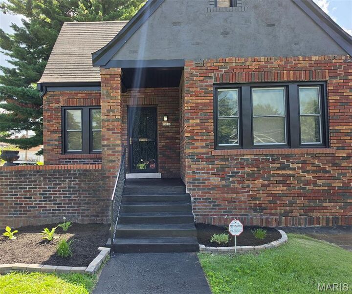 Property Photo:  8578 Drury Lane  MO 63147 