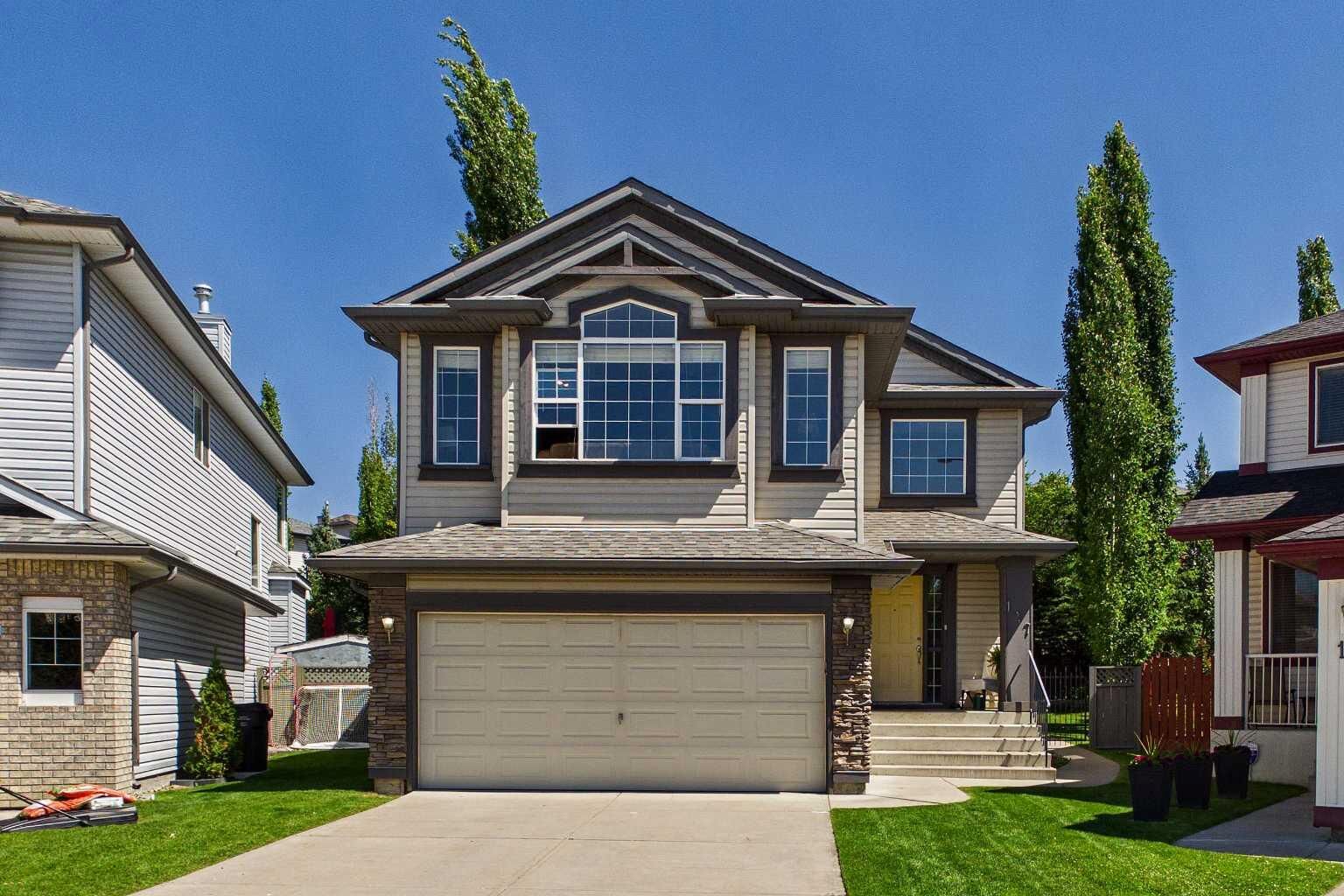 Property Photo:  147 Tuscany Meadows Court NW  AB T3L 2L3 