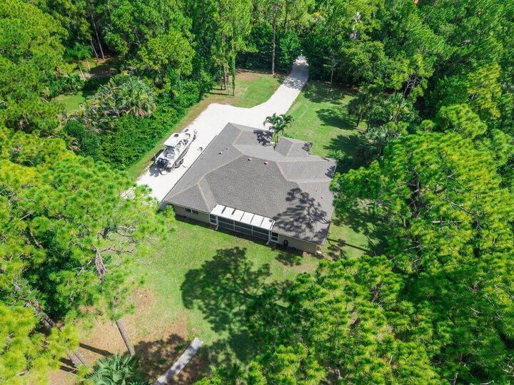 Property Photo:  9608 Mockingbird Trail  FL 33478 