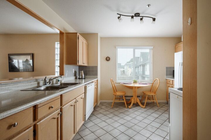 Property Photo:  4988 47A Avenue 205  BC V4K 1T5 