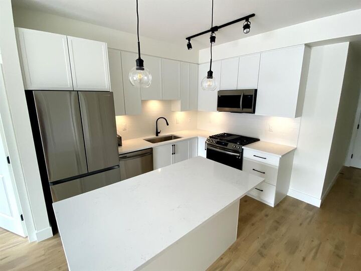 Property Photo:  19935 75A Avenue 206  BC V2Y 4L6 