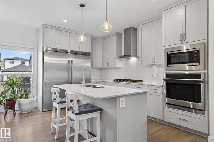 Property Photo:  3647 214 Street NW  AB T6M 1S3 
