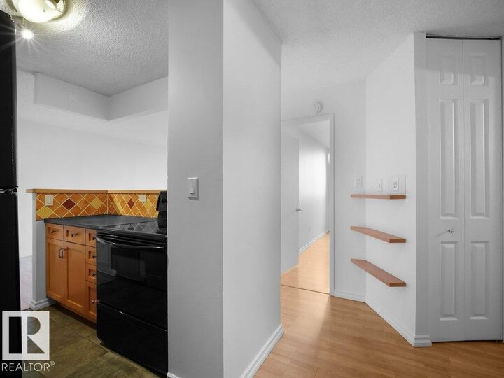 Property Photo: 13910 Stony Plain Rd NW 912 AB T5N 3R2