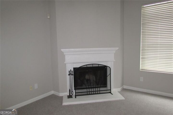 Property Photo:  5901 Ravensway Drive  GA 30058 