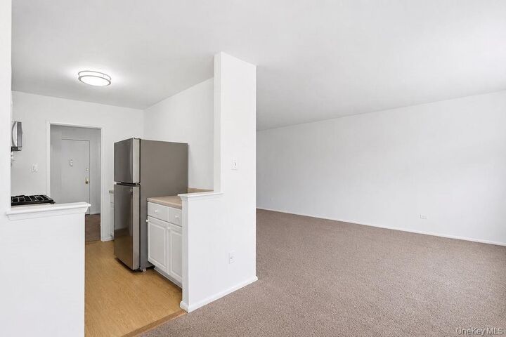 Property Photo: 84-29 153rd Avenue 5A NY 11414