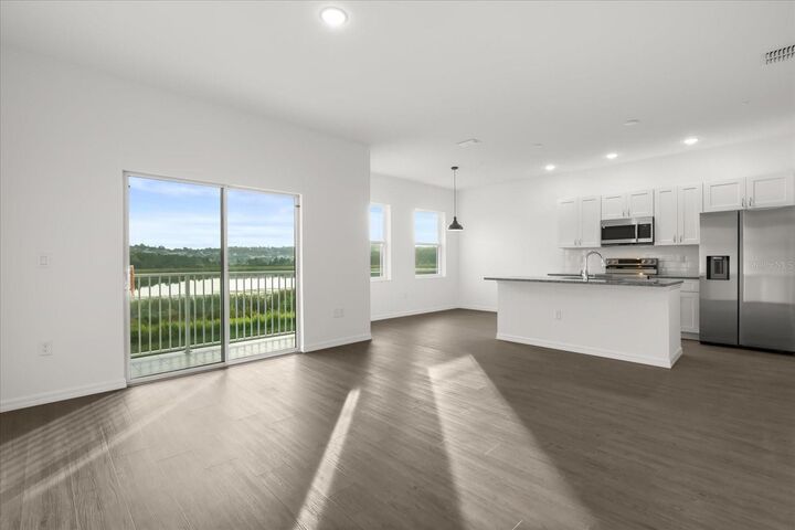 Property Photo:  915 Lakefront Village Drive  FL 34711 