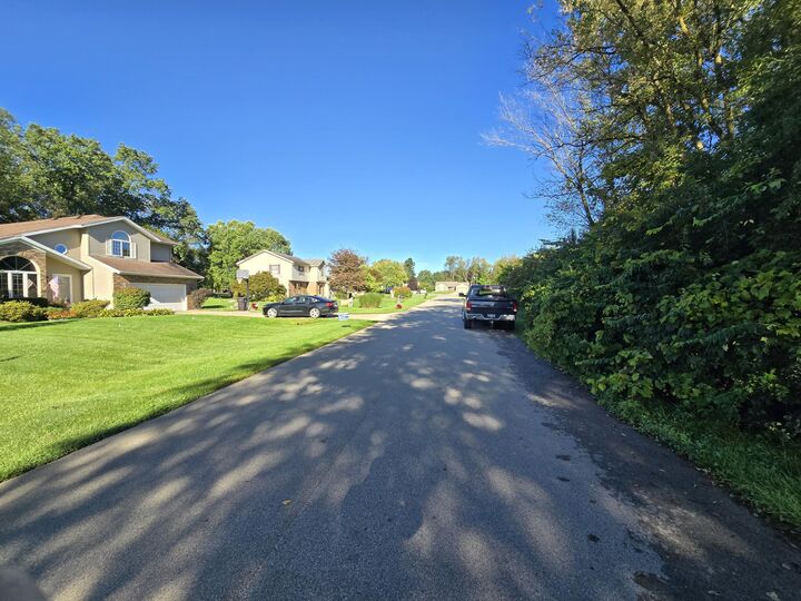 Property Photo:  .45 Lot 14 Burning Tree Lane  MI 49201 