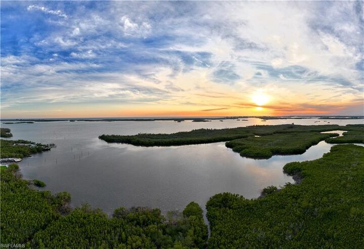 Property Photo: 5200 Seagrass Blvd 2002 FL 34134