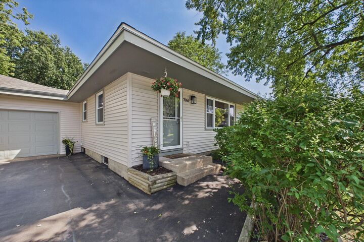 Property Photo:  7016 Colorado Avenue N  MN 55429 