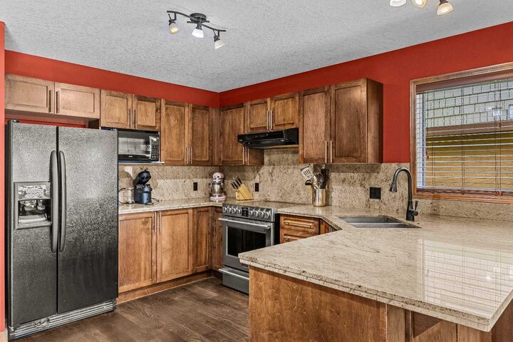 Property Photo: 108 Armstrong Place 202 AB T1W 3L2