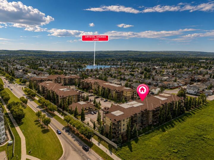 Property Photo:  92 Crystal Shores Road 4308  AB T1S 2N2 