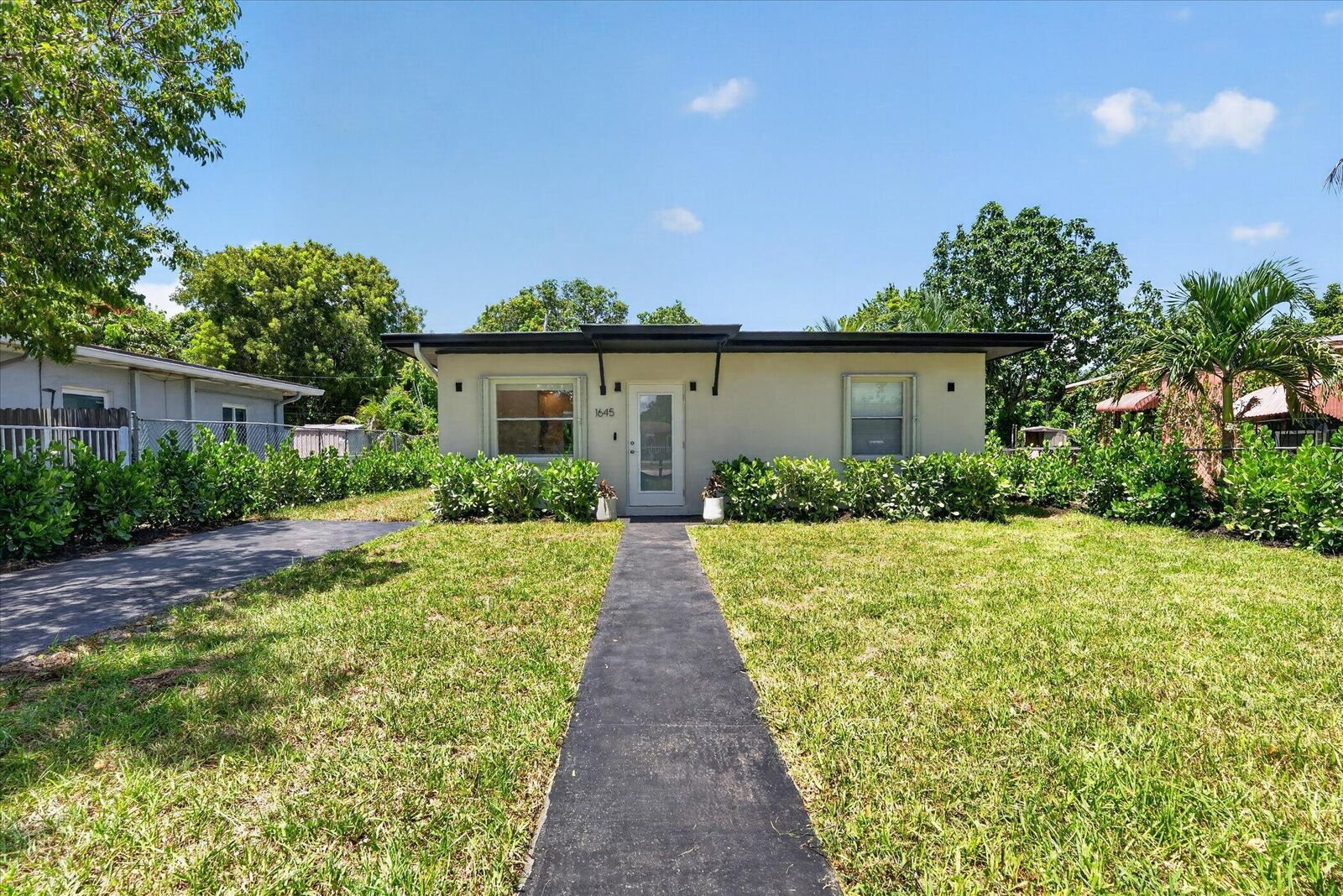 Property Photo:  1645 NW 121st Street  FL 33167 