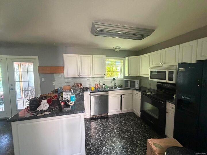 Property Photo:  1933 Galerno Rd  BC V9W 1K8 