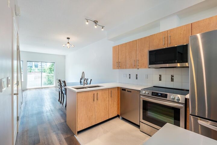 Property Photo: 730 Farrow Street 21 BC V3J 7Y7