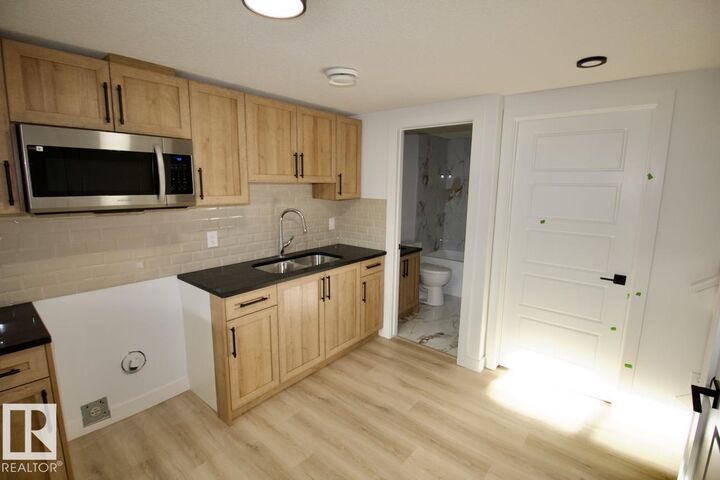 Property Photo: 8857 Carson Way SW Bsmt AB T6W 5B8