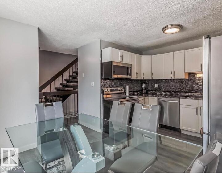 Property Photo:  3221 132A Avenue NW  AB T5A 3K4 
