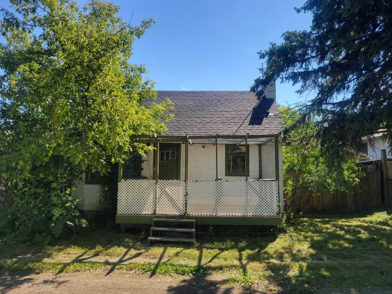 Property Photo: 1 Elm Avenue AB T1S 1K6