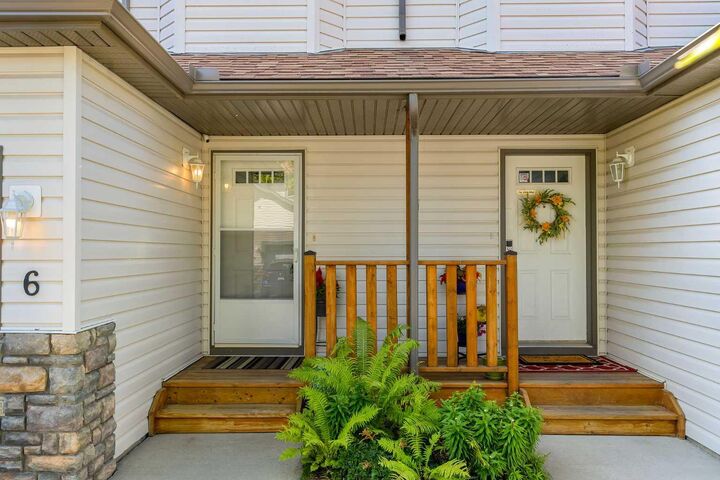 Property Photo: 156 Canoe Drive SW 6 AB T4B 2Z3