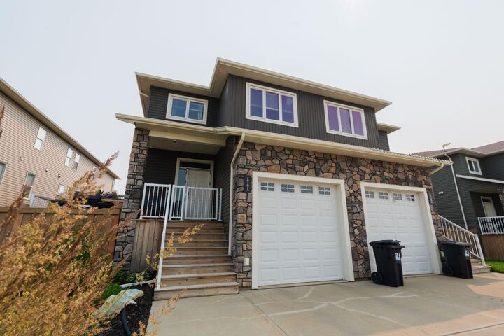 Property Photo:  10307A 149 Avenue  AB T8X 0S1 